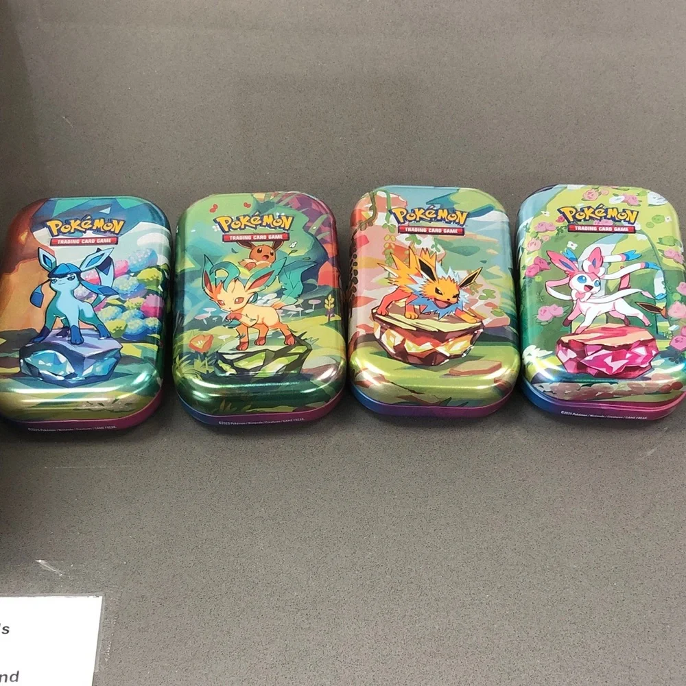 Pokemon Eeveelutions Tin Set - Blue Green Pink Yellow